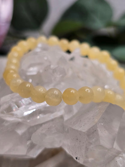 Armband Orangencalcit – 6 mm Kugeln, handgefertigt & maßgefertigt (XS–XL)